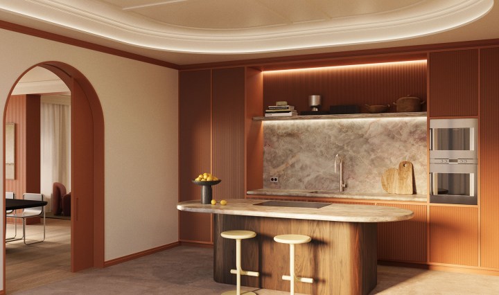 Modern kitchen interior featuring a sculptural pleated wall panel in warm terracotta tones, marble backsplash and curved island, showcasing contemporary architectural wall design by NOËL & MARQUET